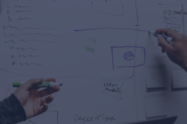 whiteboard with hands